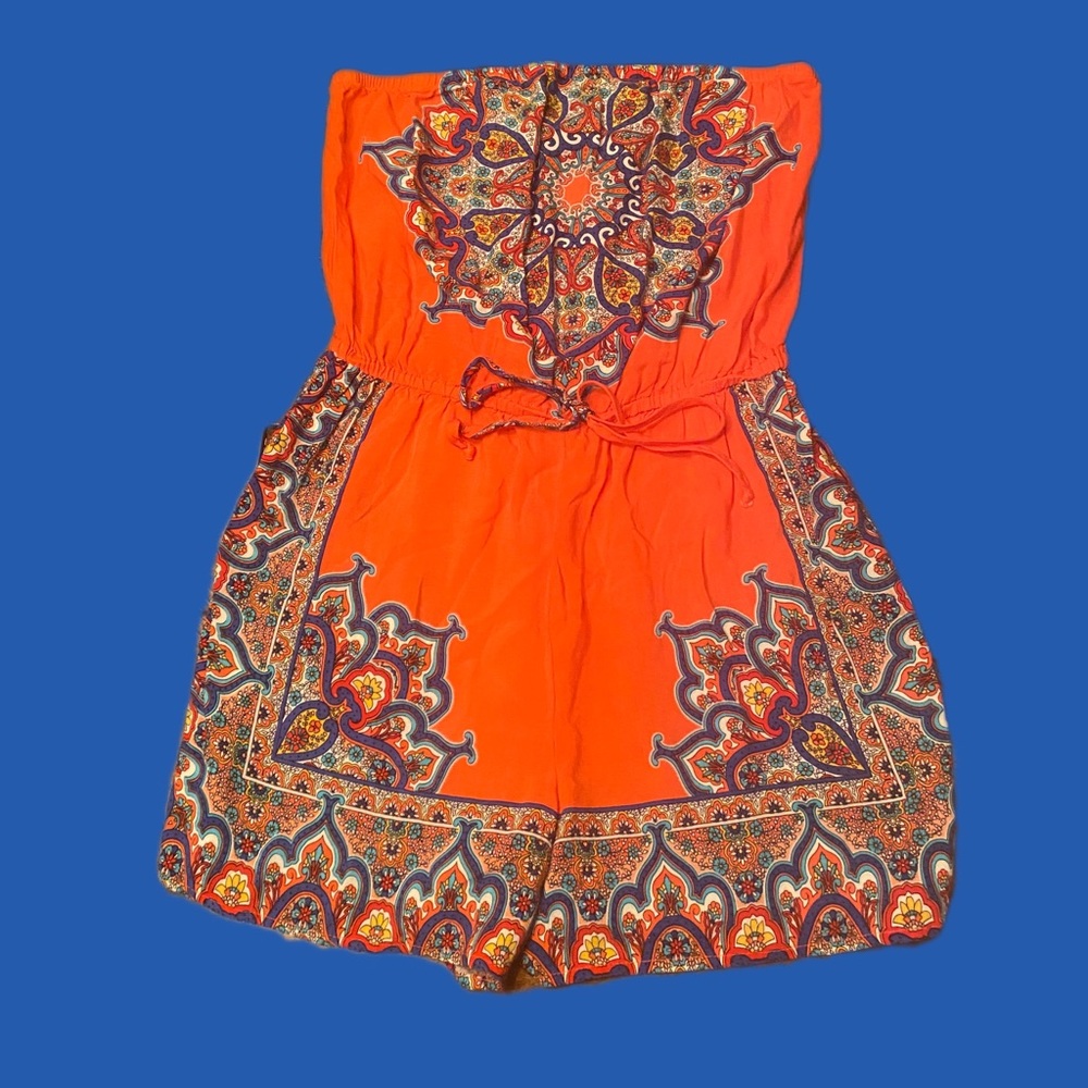 I am giving away another cute romper that is soft and includes cool designs.
